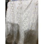 A pair of drapes cream circle motif each panel 108 x 242cn