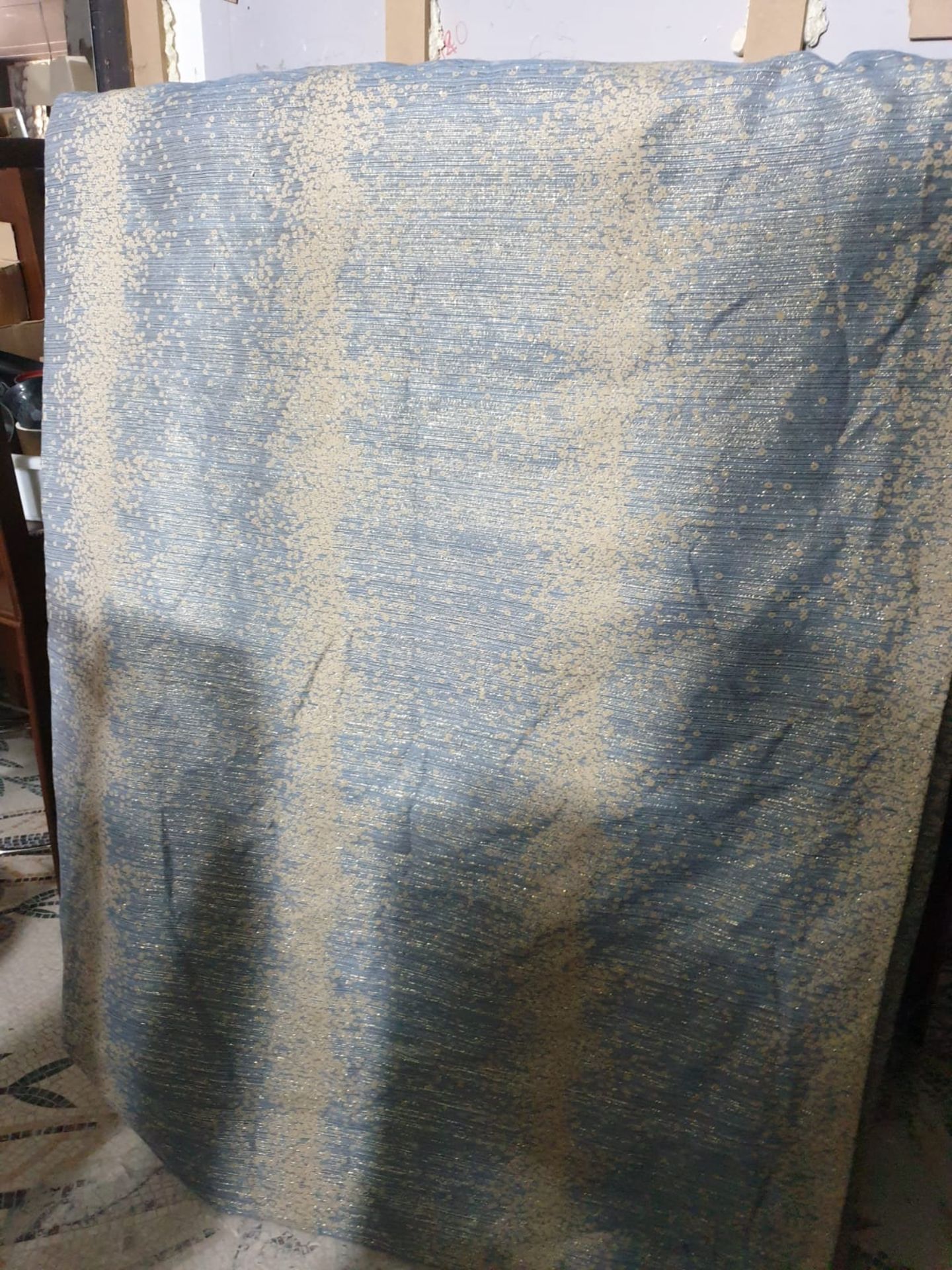 A pair of silk drapes blue silver sparkle each panel 129 x 246cm