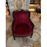 A Red Upholstered Lounge Chair With Mahogany Arms And Studied Back 68x 60x 91cm