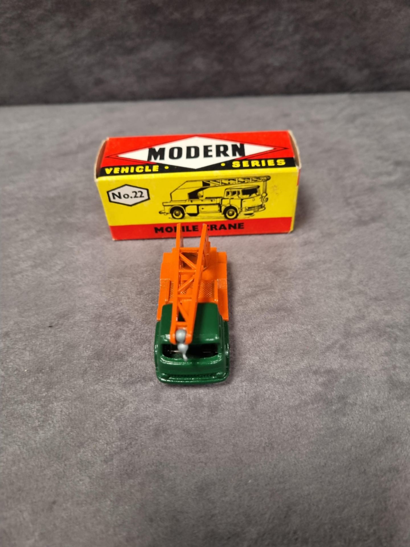 Budgie Modern Vehicle Series #22 Mobile crane with green chassis 3, long base orange platform, jib/