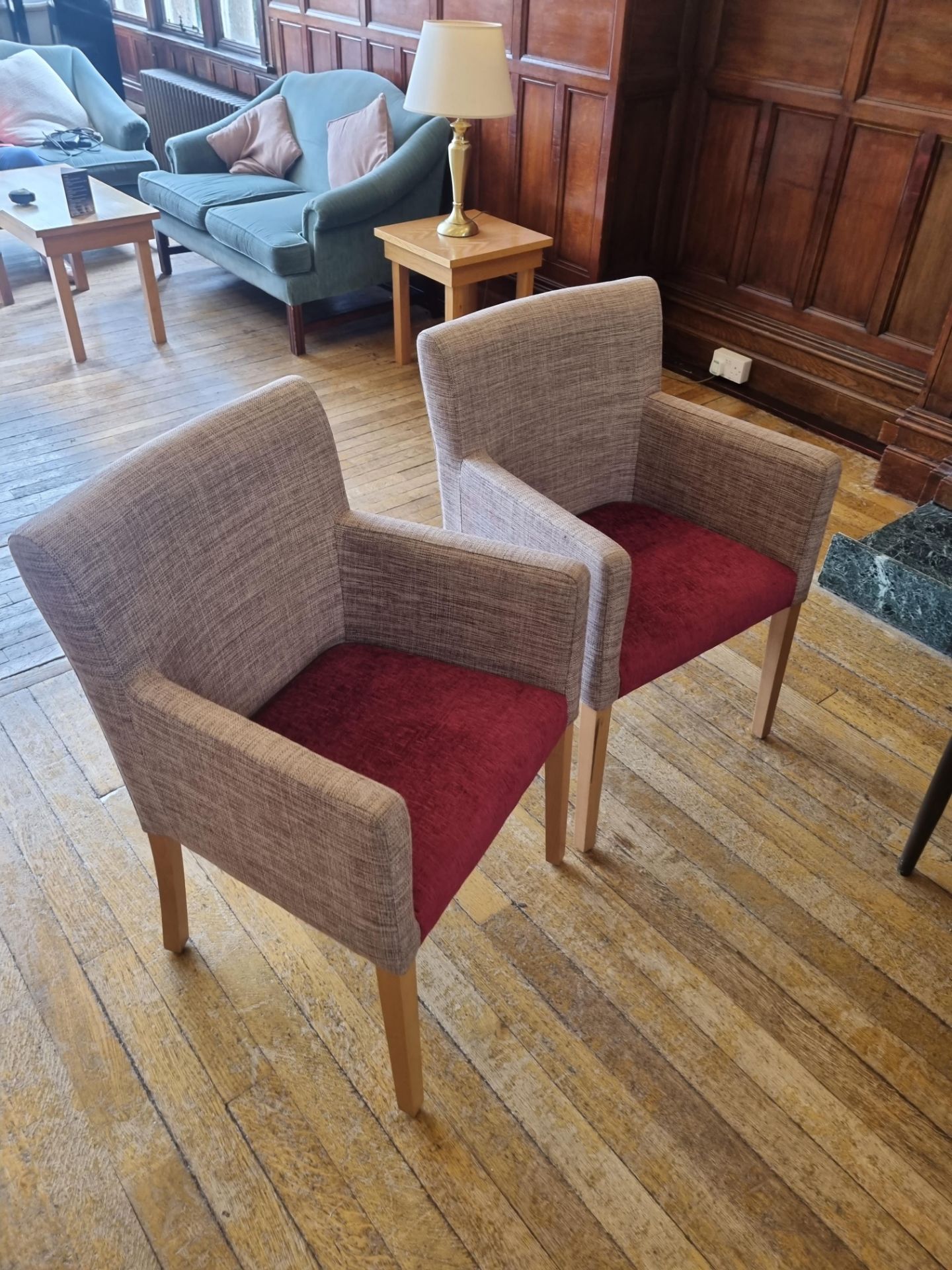 A Pair Of Beige Arm Chairs With Red Seat On Wooden Legs W 620mm D 450mm H 900mm