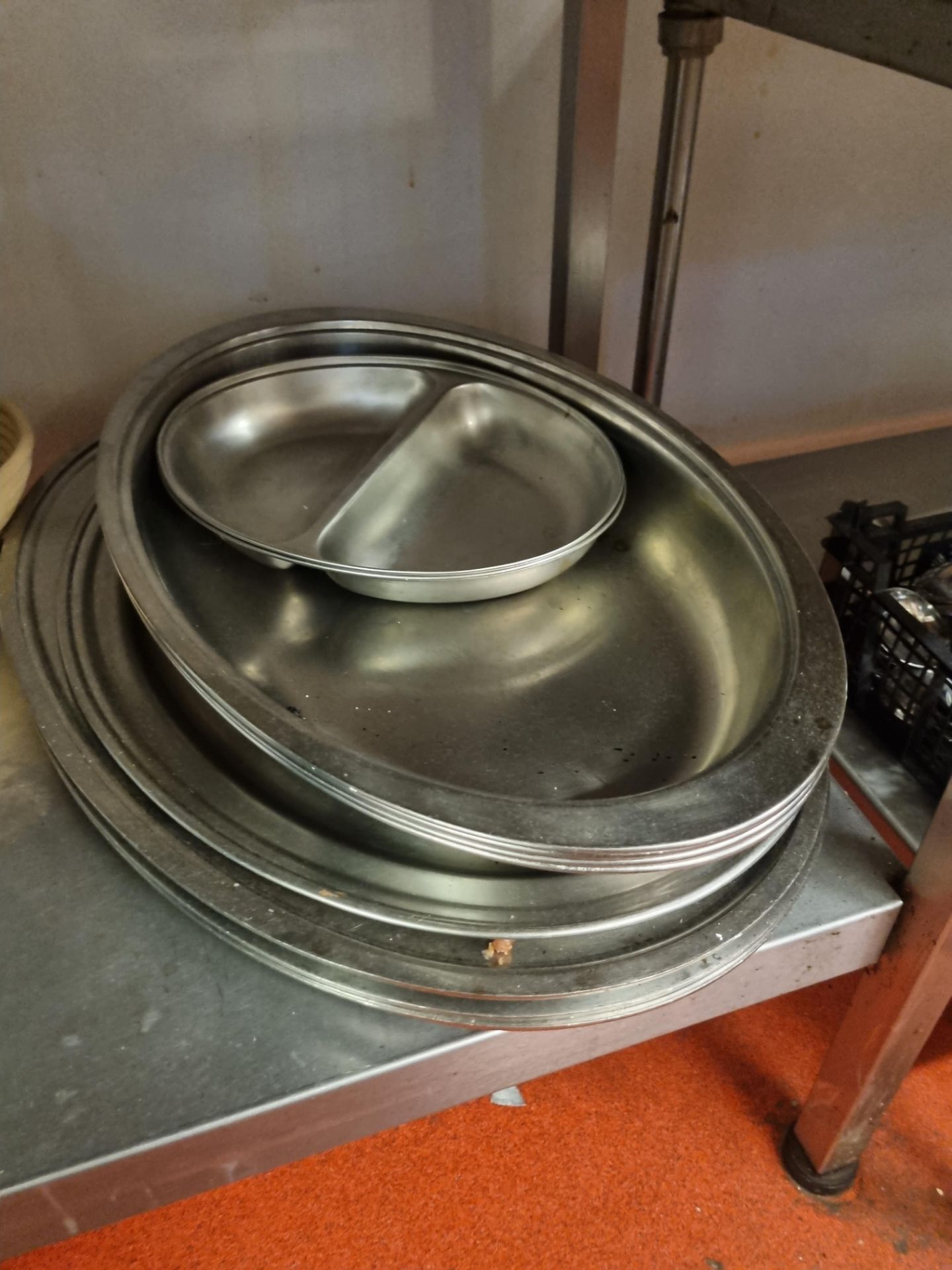A Quantity Of Various Sized Stainless Steel Platters