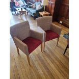 A Pair Of Beige Arm Chairs With Red Seat On Wooden Legs W 620mm D 450mm H 900mm