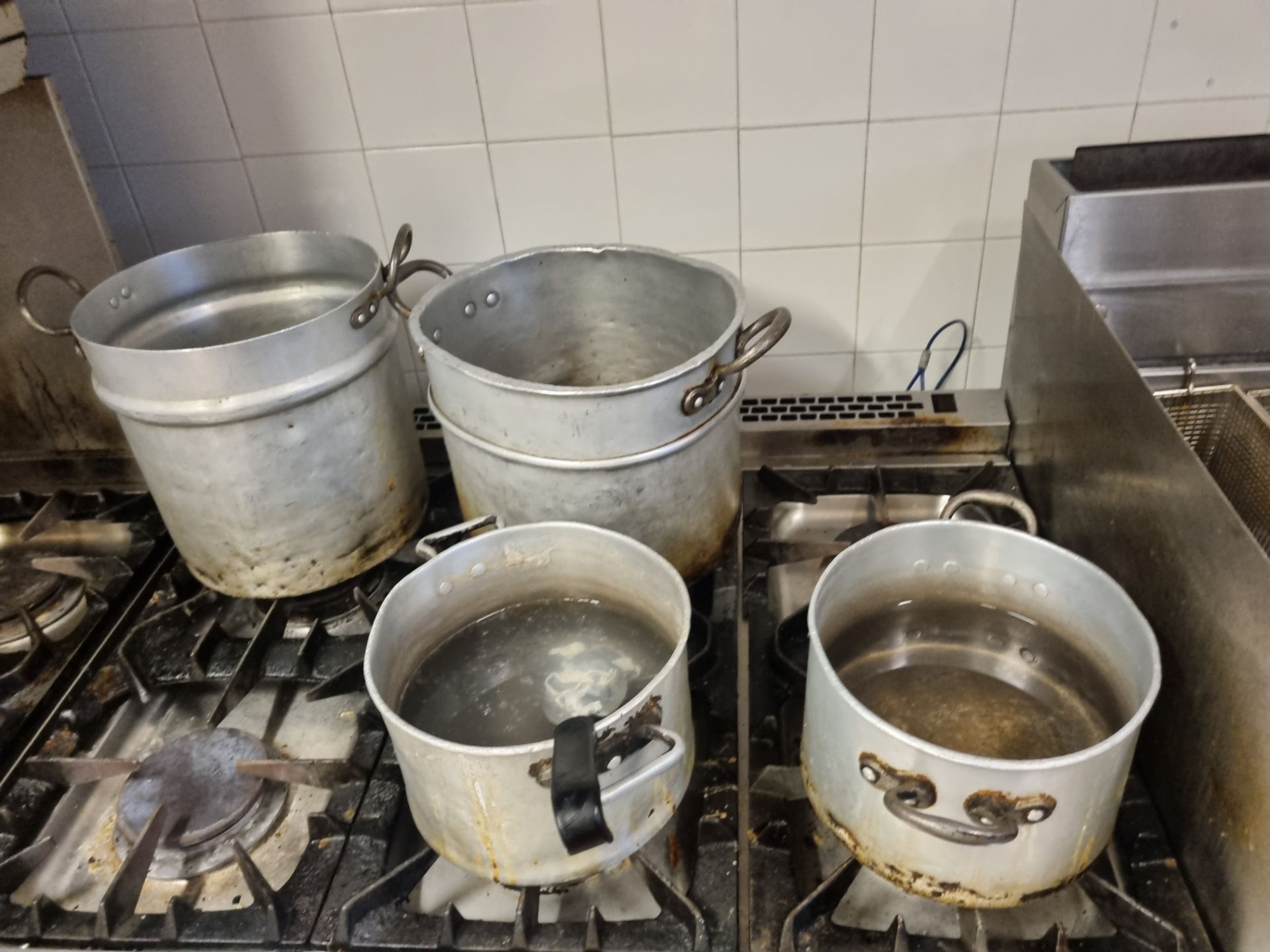 A Large Quantity Of Various Sized Aluminium Stock Pots