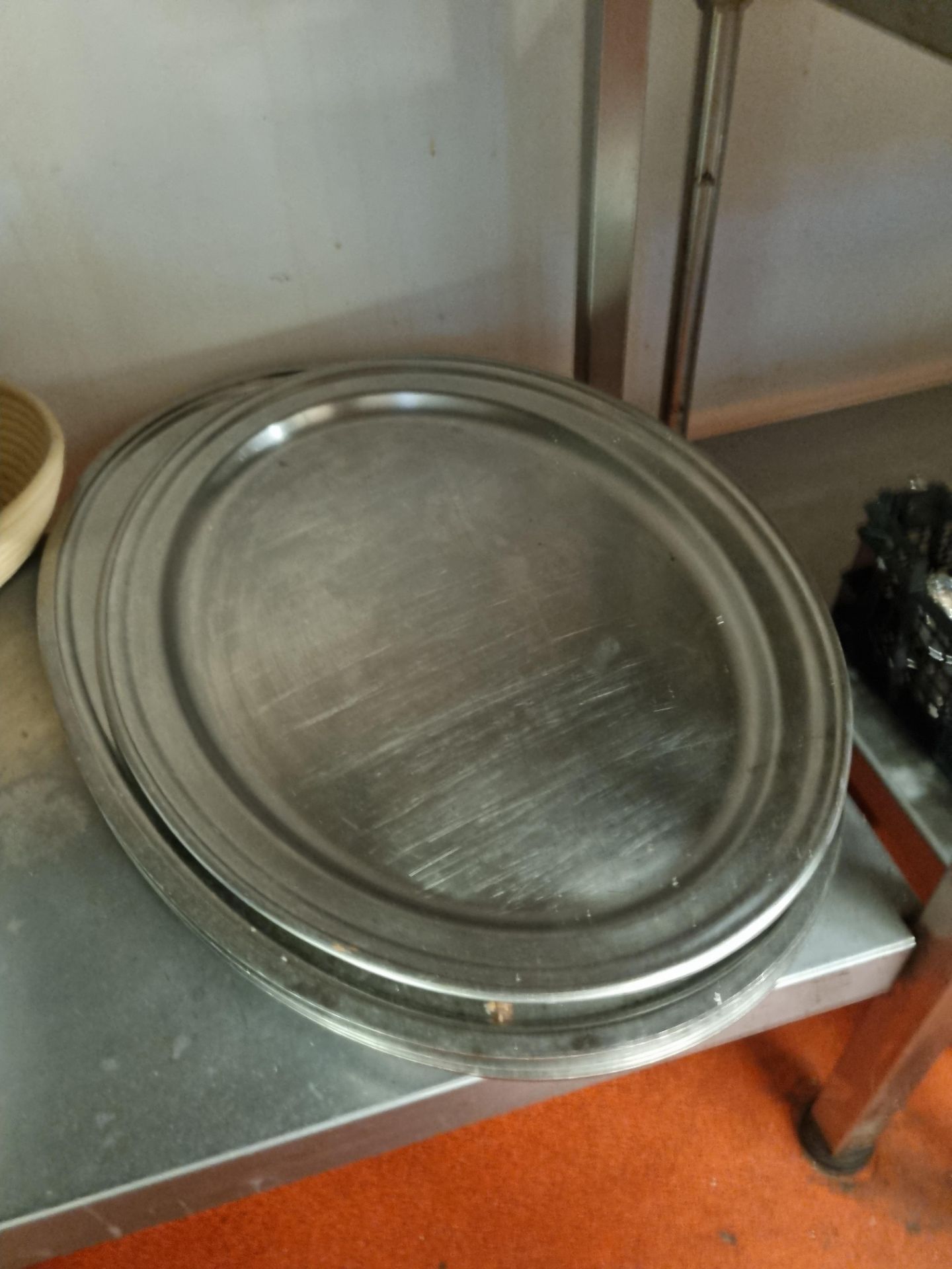 A Quantity Of Various Sized Stainless Steel Platters