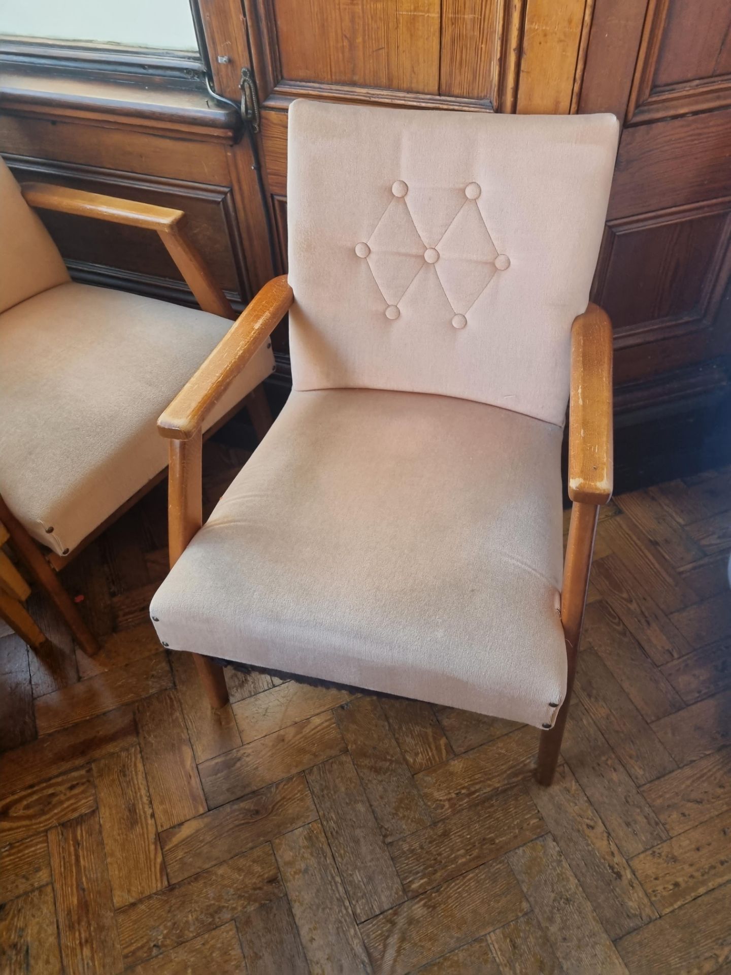 A Pair Of Wooden Beige Arm Chairs With Button Back Upholstery W 500mm D 460mm H 770mm