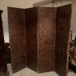 A 17th century style leather covered four fold screen, probably Spanish. Each fold covered in two