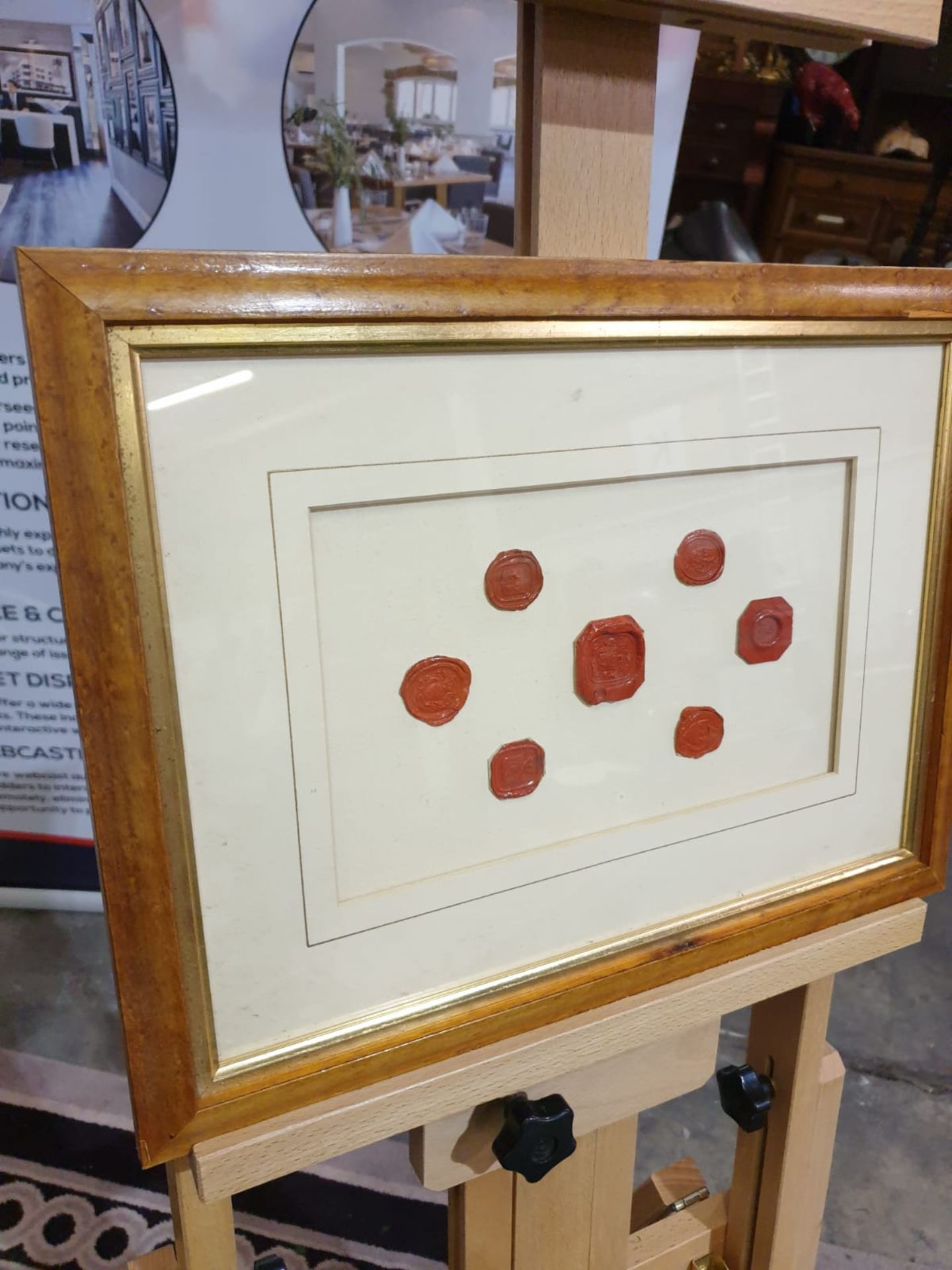 Framed artwork of wax Seals in Wood frame 42 x 32cm