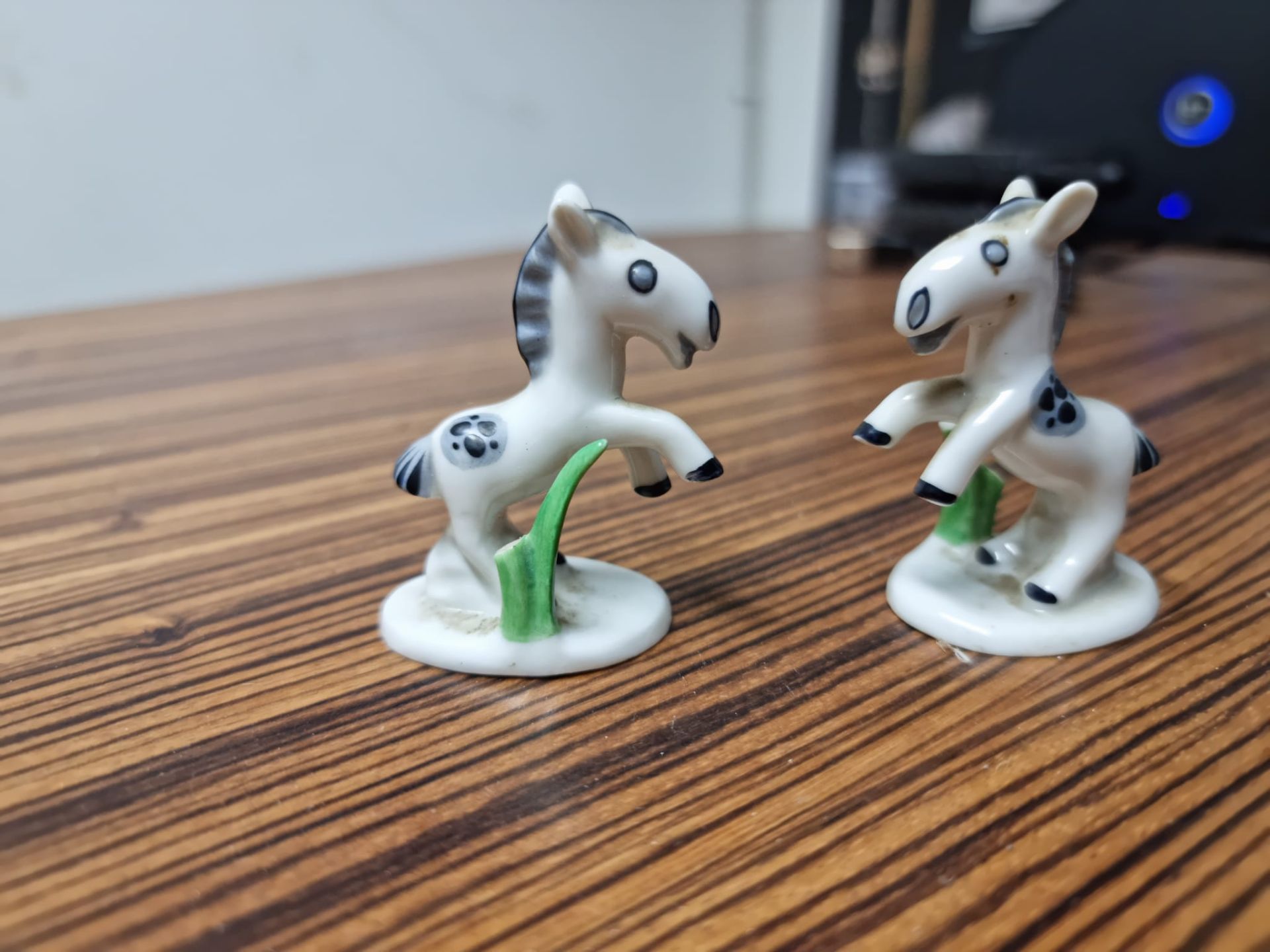 A pair of Vintage Metzler & Ortloff Germany glazed porcelain ponies with makers mark stamped Foreign