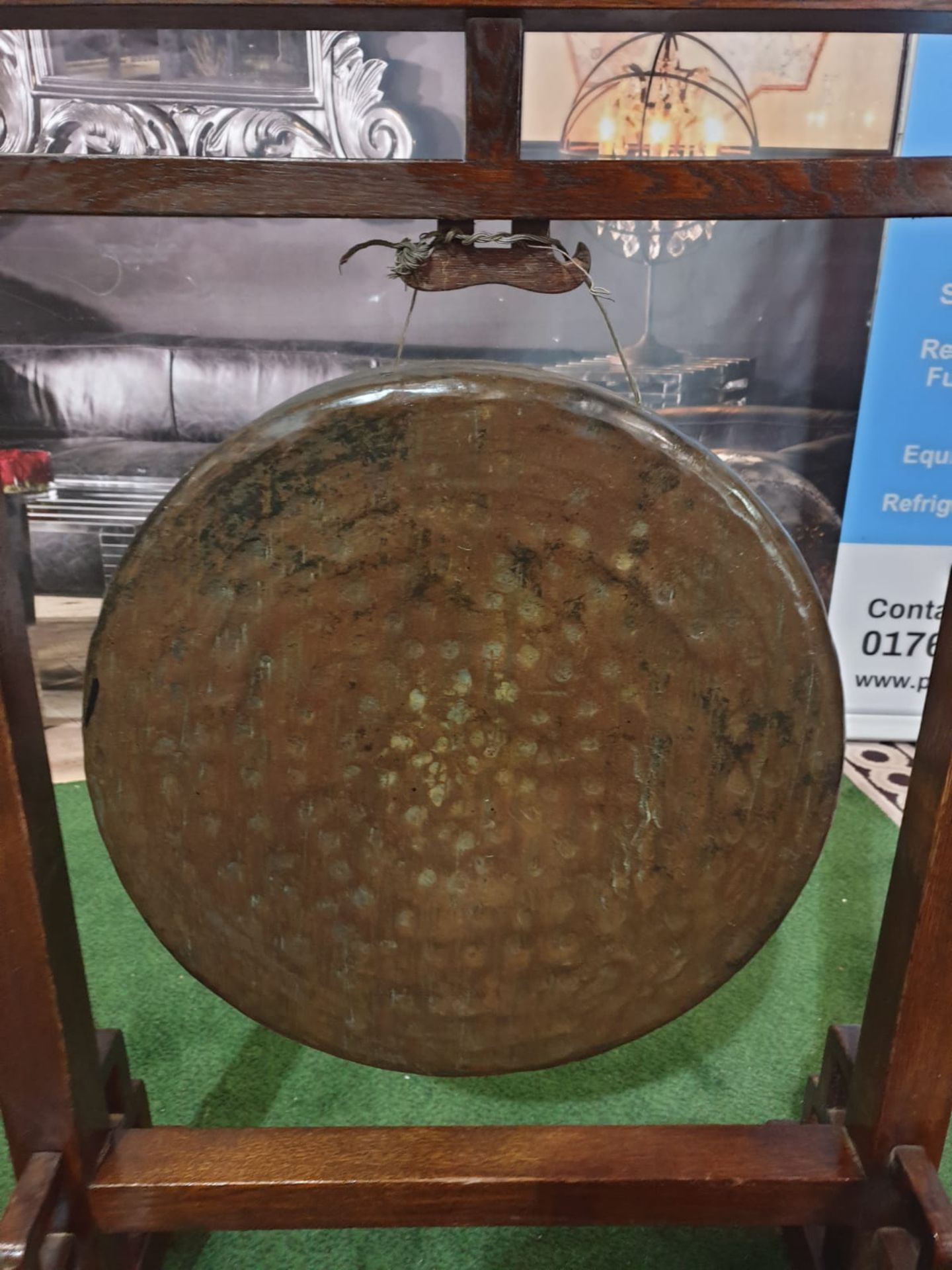 An Oriental brass gong on wooden stand An oriental, possibly Chinese circular hammered brass gong on - Image 3 of 6