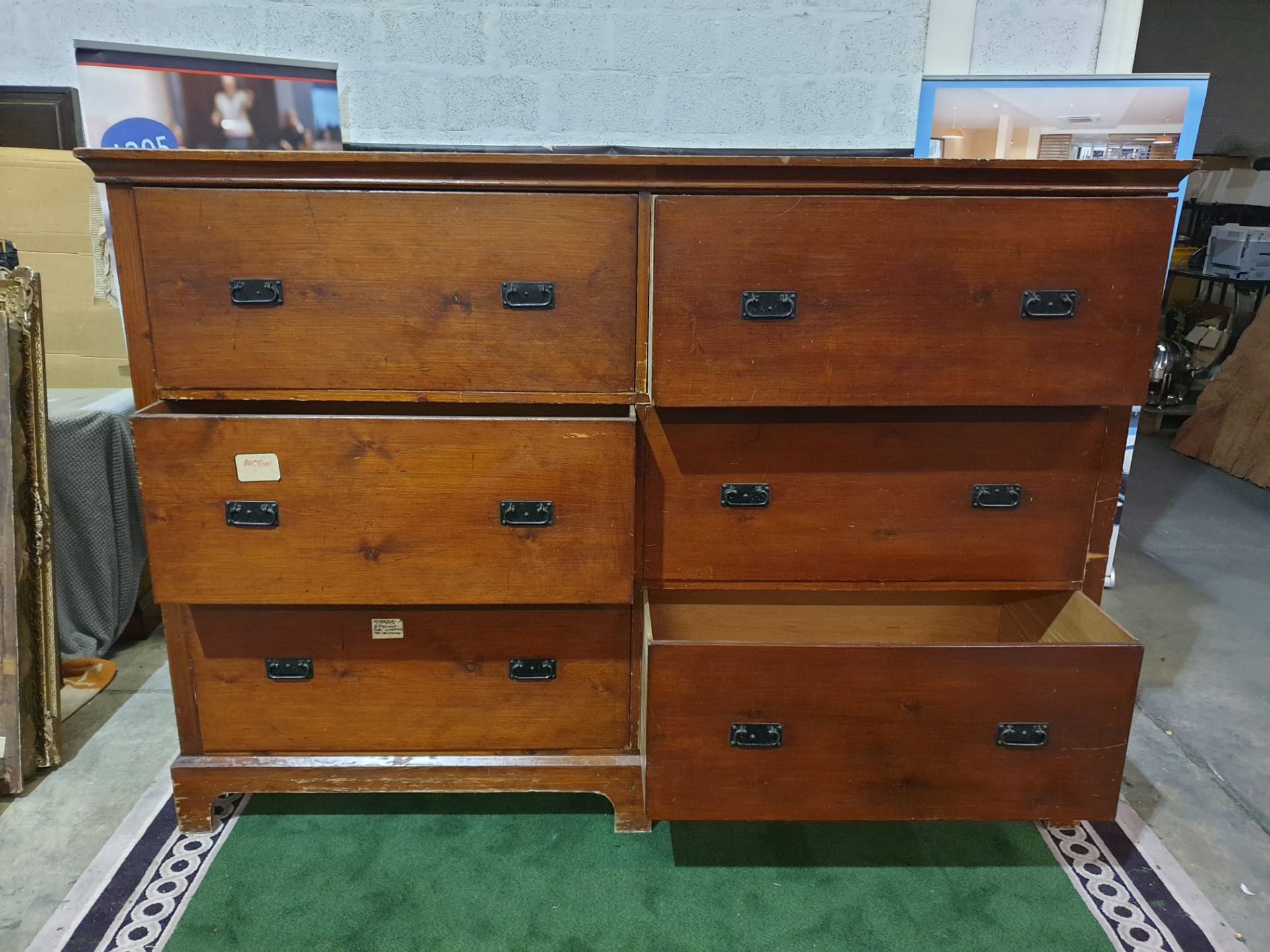 A large late Victorian stained pine chest of drawers. With two banks of three deep drawers, each - Bild 2 aus 4