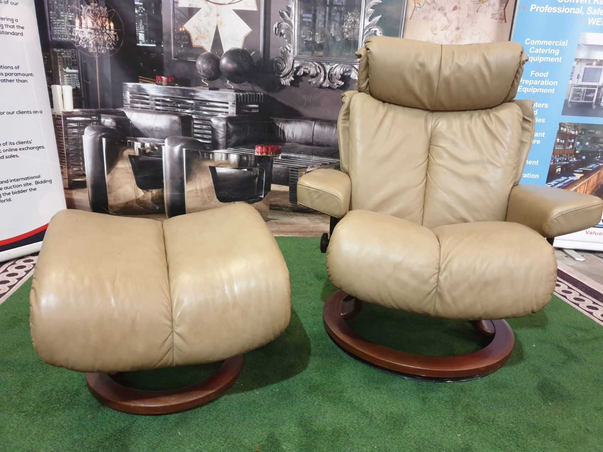 An Ekornes `Stressless` leather covered adjustable chair and stool, Norway. The pale caramel brown - Image 3 of 4
