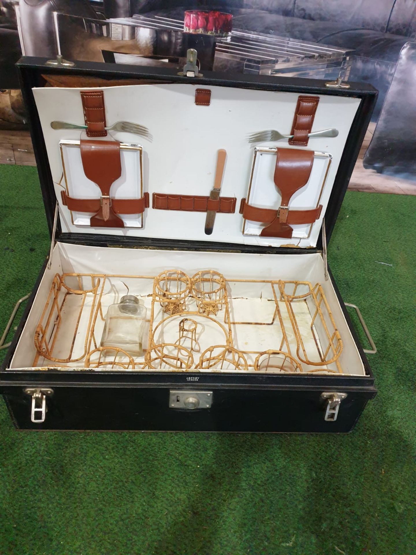 A vintage black picnic box with partial set contained as photographed 61 x 38 x 19cm