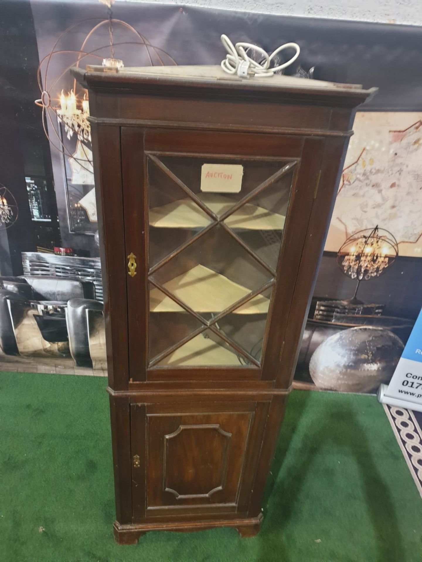 A mahogany standing corner cupboard in George III style. The moulded cornice above a single glazed - Image 3 of 5