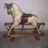 Haddon Glider Rocking horse Missing his tail, and he has some minor wear and tear to paint. He is in