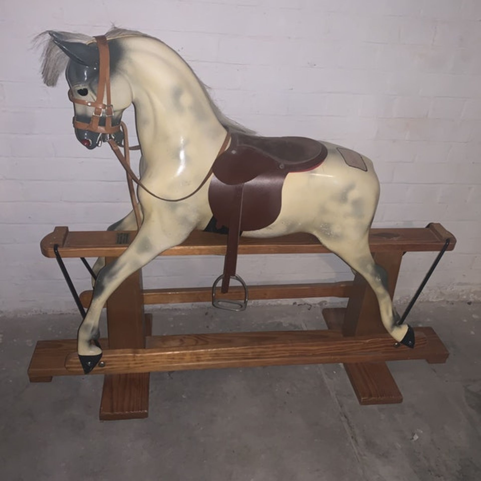 Haddon Glider Rocking horse Missing his tail, and he has some minor wear and tear to paint. He is in