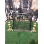 A cast metal fire guard with a pair of Brass Fire Andirons Ornate yet simple and elegant design in