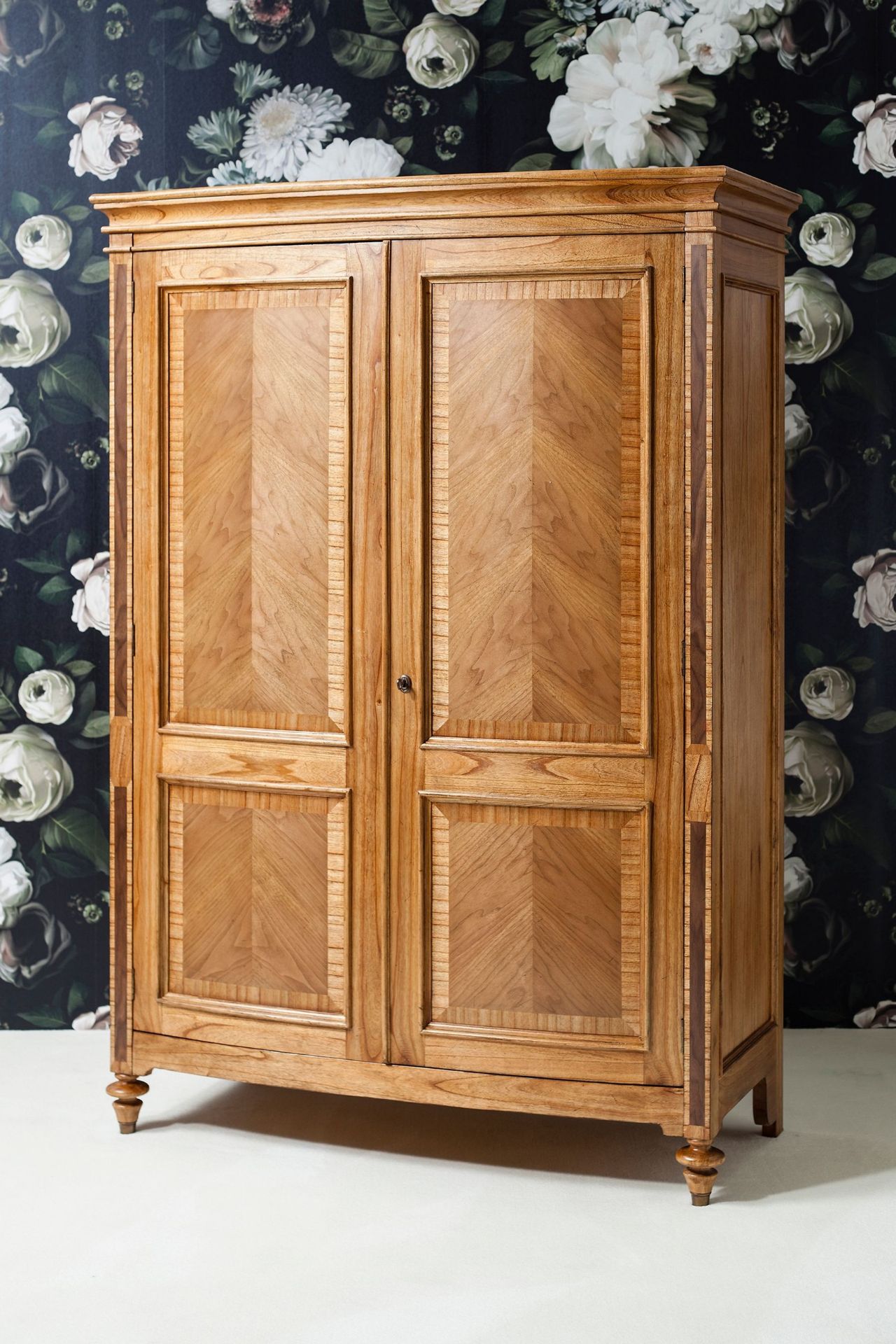 Spire 2 Door Wardrobe Featuring beautiful marquetry of Blonde European Walnut with intricate