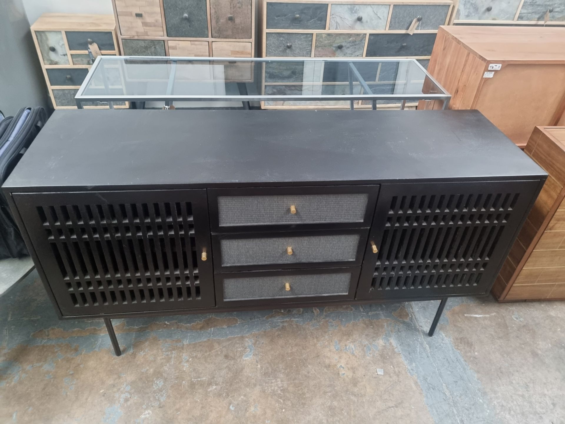 Baston Sideboard A Timeless And Sculptural Sideboard The Black Solid Wood Sideboard Features Doors