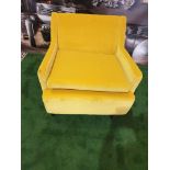 A velvet golden yellow library chair