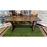 Oak Farmhouse Table This substantial dining table has a chunky rectangular top with a polished