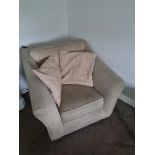 A Cream Arm Chair With Wooden Feet W 950mm D 1000mm H 750mm