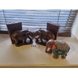 A Pair Of Wooden Elephant Bookends And An Ornamental Indian Elephant