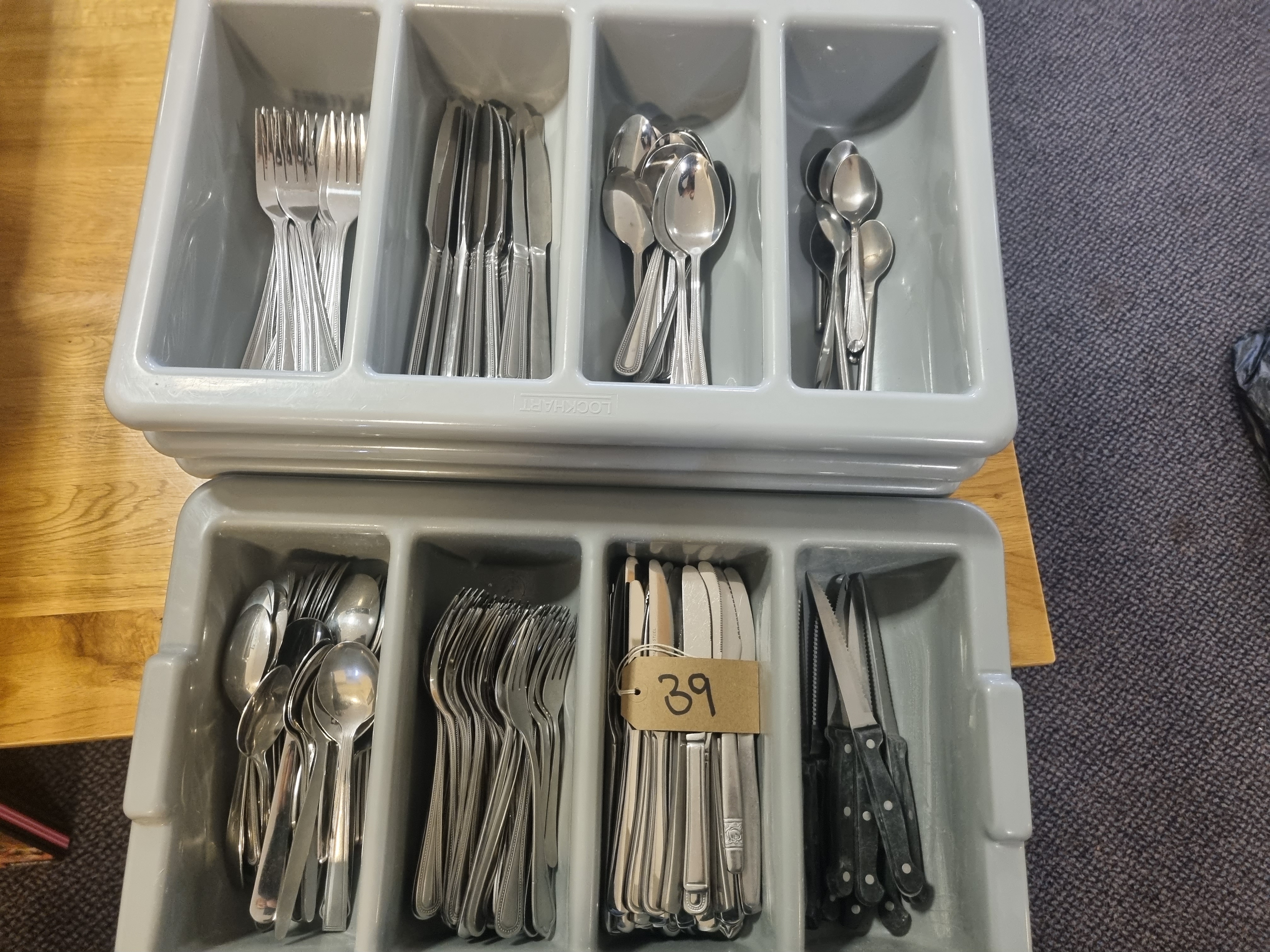 A Large Quantity Of Cutlery Comprising Of Knives Forks Spoons and Steak Knives - Complete With 4