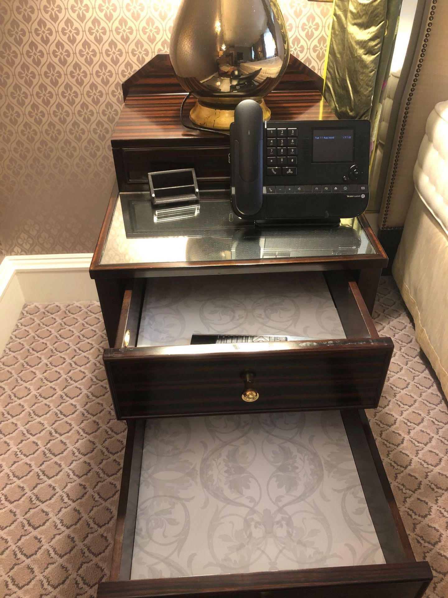 A Pair Of Two Tier Bedside Nightstands With Antiqued Plate Top With Storage Compartments Mounted