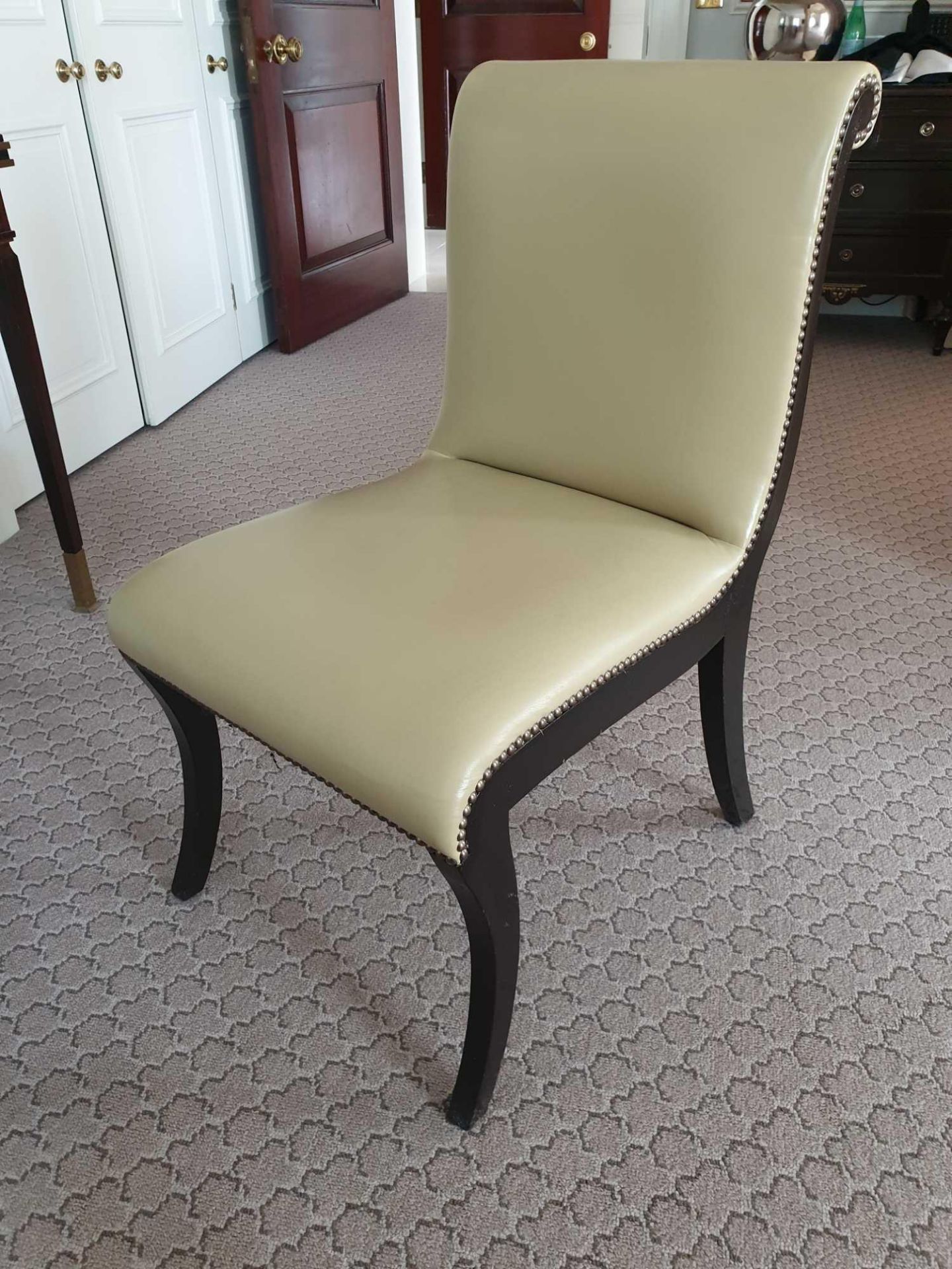 Sroll Back Leather Side Chair Legs And Frame In Solid Oak With A Stained Finish Upholstered In