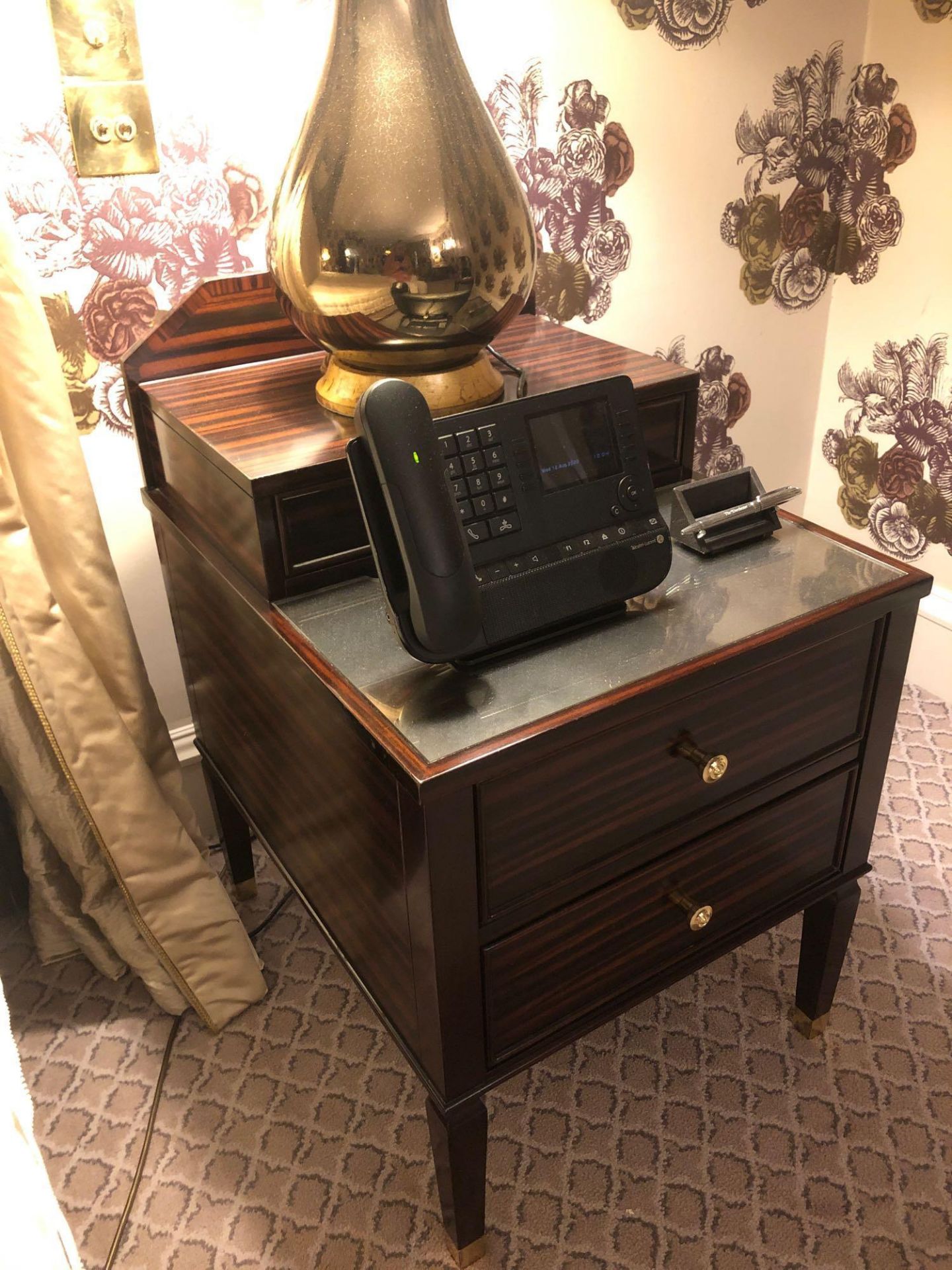 A Pair Of Two Tier Bedside Nightstands With Antiqued Plate Top With Storage Compartments Mounted