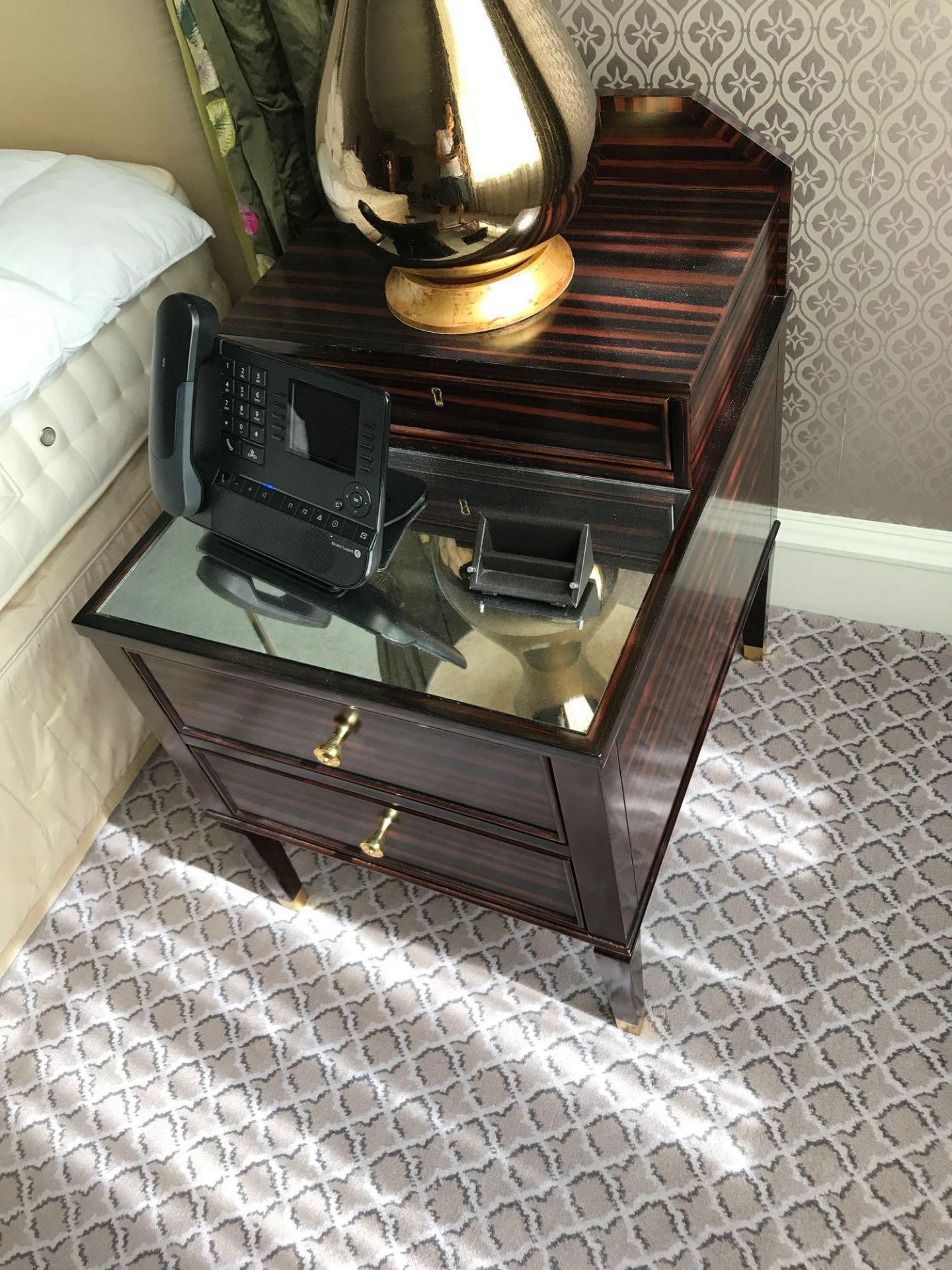 A Pair Of Two Tier Bedside Nightstands With Antiqued Plate Top With Storage Compartments Mounted