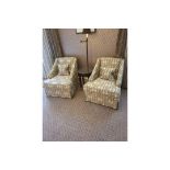 A Pair Of Egerton Armchair Sloping Arms, Dressmakers Skirt And A Sprung Back Upholstered In Gold And