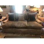 A Classic Upholstered Three Seater Sofa Upholstered In Beige Complete With Scatter Cushions (Room