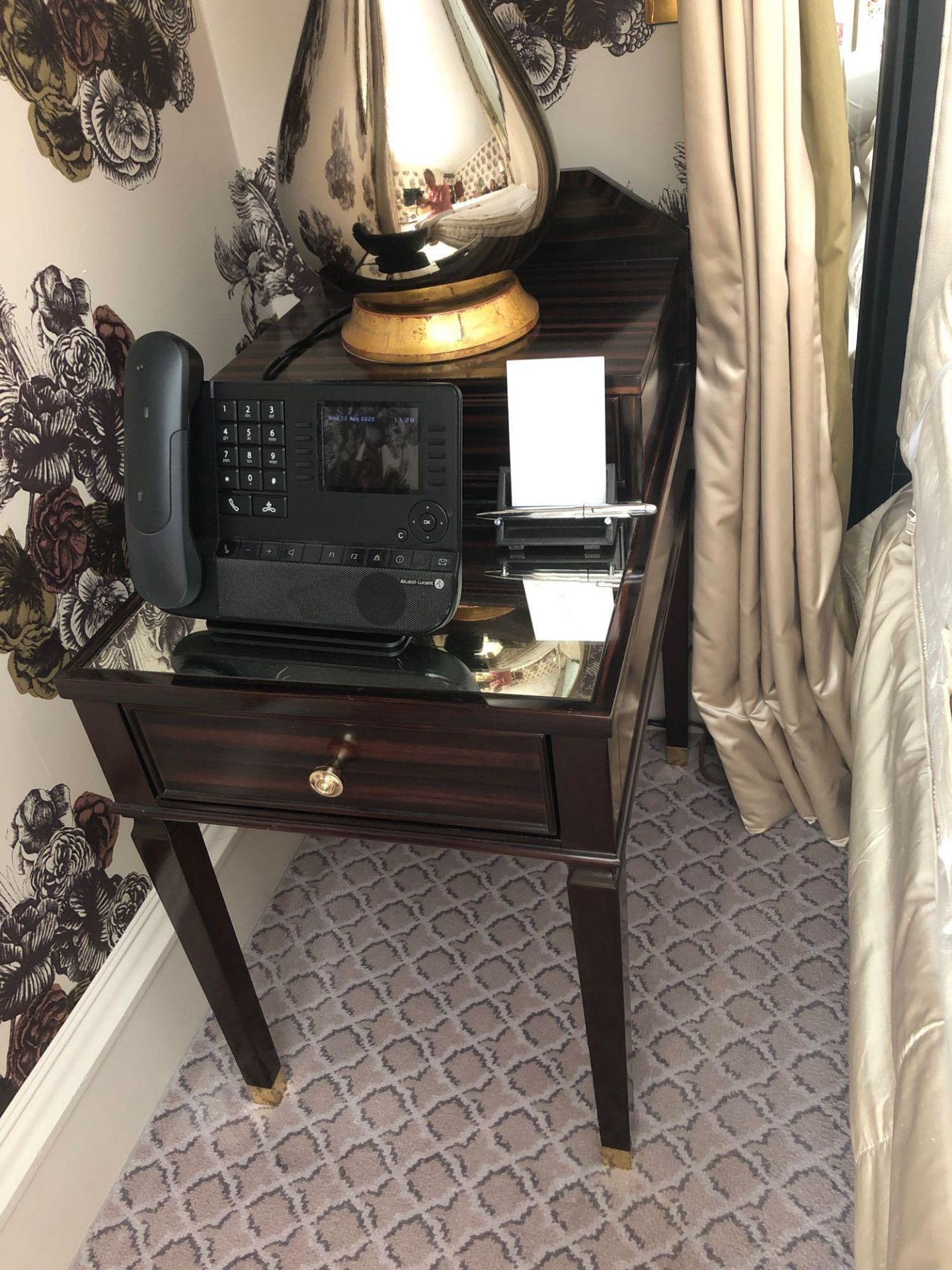 A Pair Of Two Tier Bedside Nightstands With Antiqued Plate Top With Storage Compartments Mounted