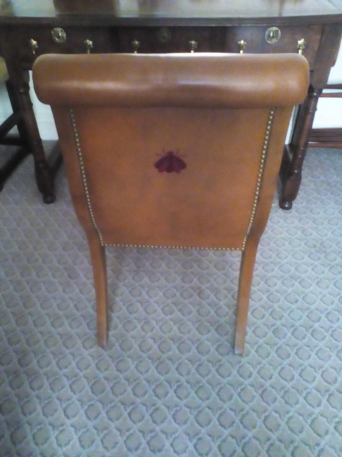 Scroll Back Leather Side Chair Legs And Frame In Solid Oak With A Stained Finish Upholstered In