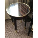 Circular Side Table With Antiqued Plate Top And Brass Trim Mounted On Tapering Legs With Brass