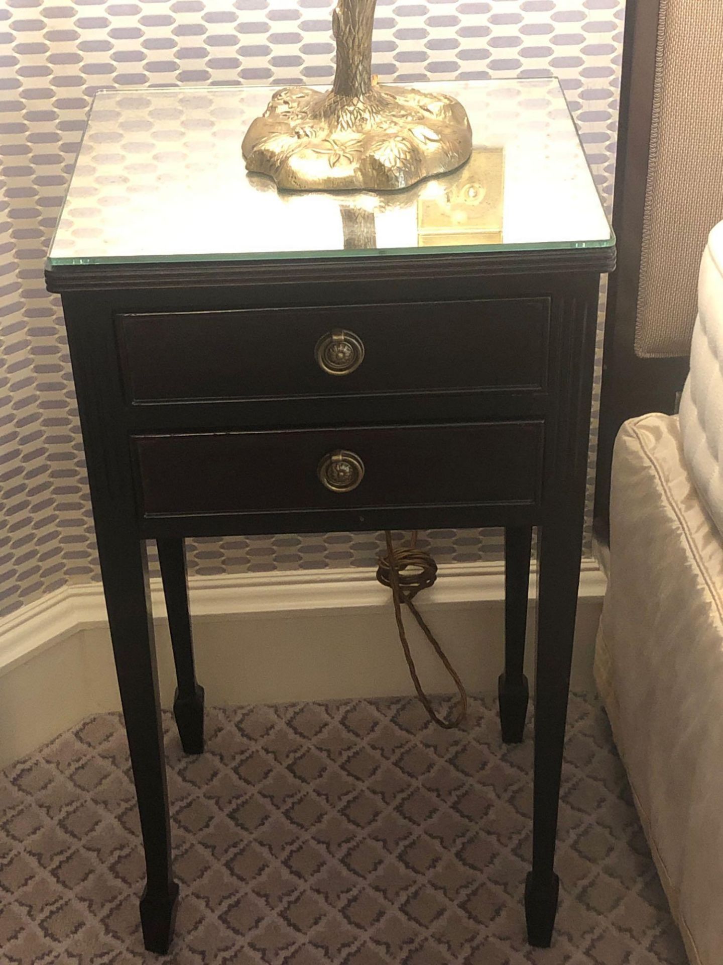 A Pair Of Tall Bedside Tables Featuring Two Drawers With A Mirrored Top Surface On Tapered Legs 34 x