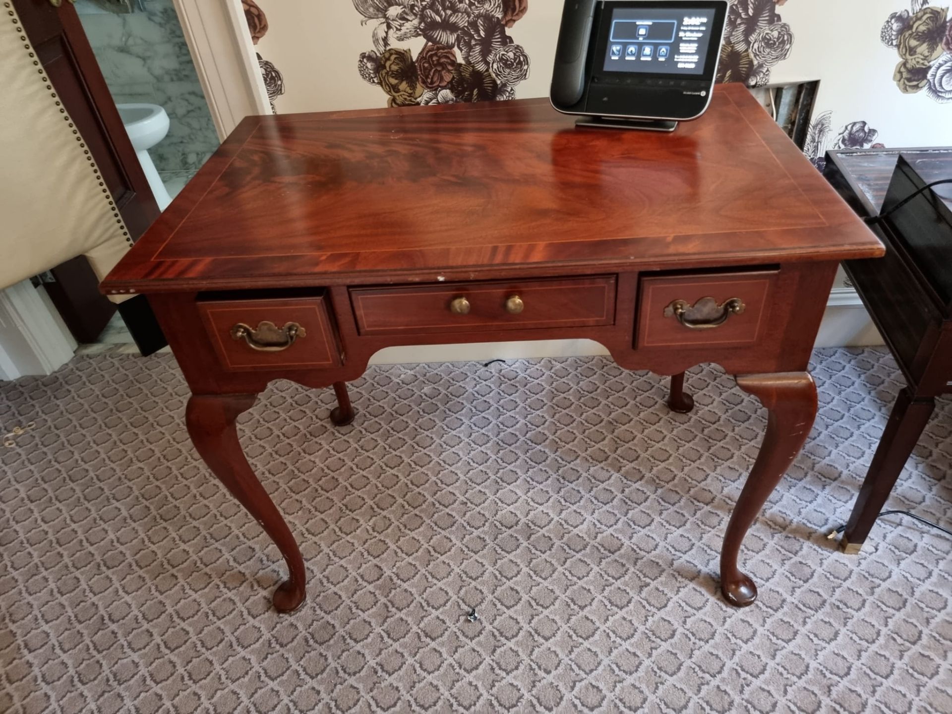 A Three Drawer Writing Desk on Queen Anne Legs (Room 120)