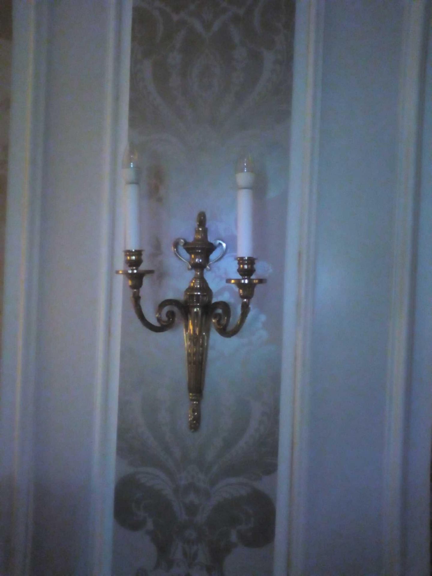 A Pair Of Wall Appliques Twin Leaf Capped Scroll Arms Issuing From A Well-Cast Single Decorative