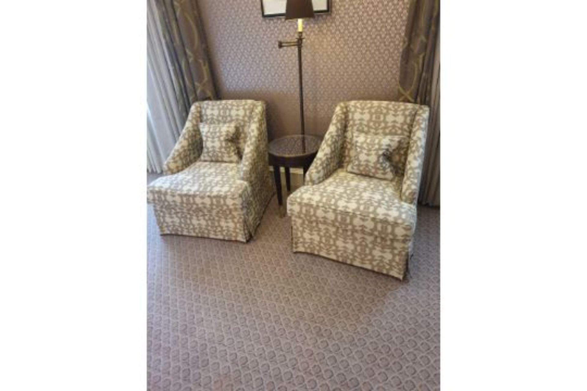 A Pair Of Egerton Armchair Sloping Arms, Dressmakers Skirt And A Sprung Back Upholstered In Gold And