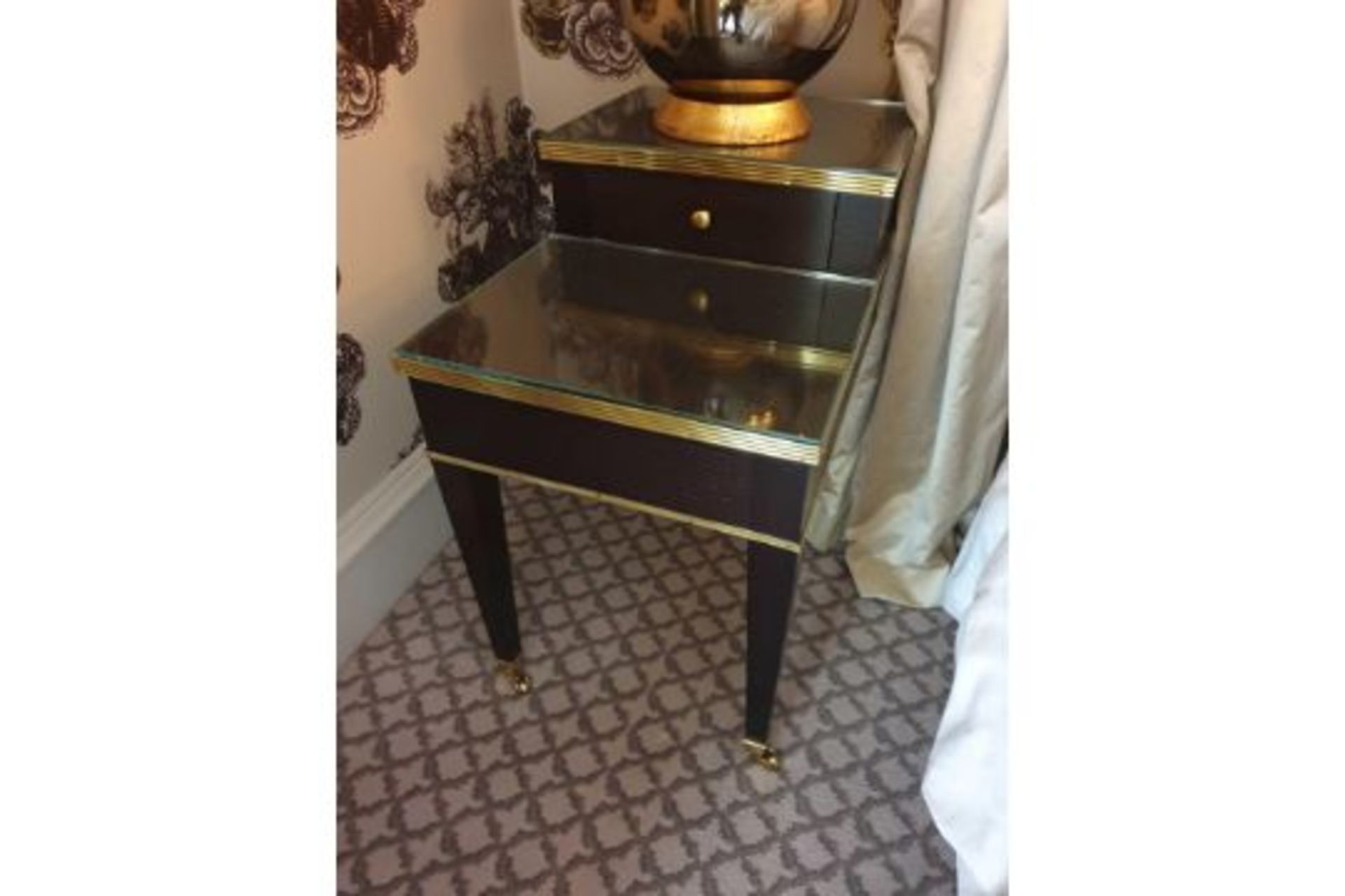 A Pair Of Two Tier Bedside Nightstands With Antiqued Plate Top With Storage Compartments Mounted