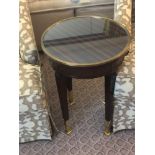 Circular Side Table With Antiqued Plate Top And Brass Trim Mounted On Tapering Legs With Brass