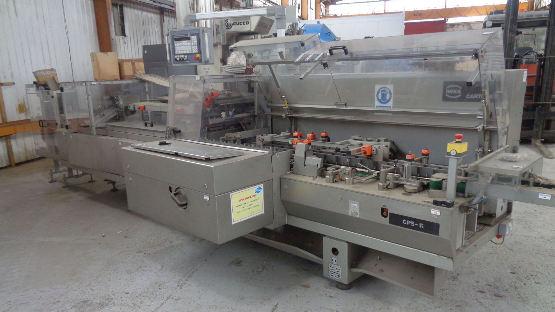 IWKA Model CPS-R Automatic Horizontal Blisterpack Cartoner.