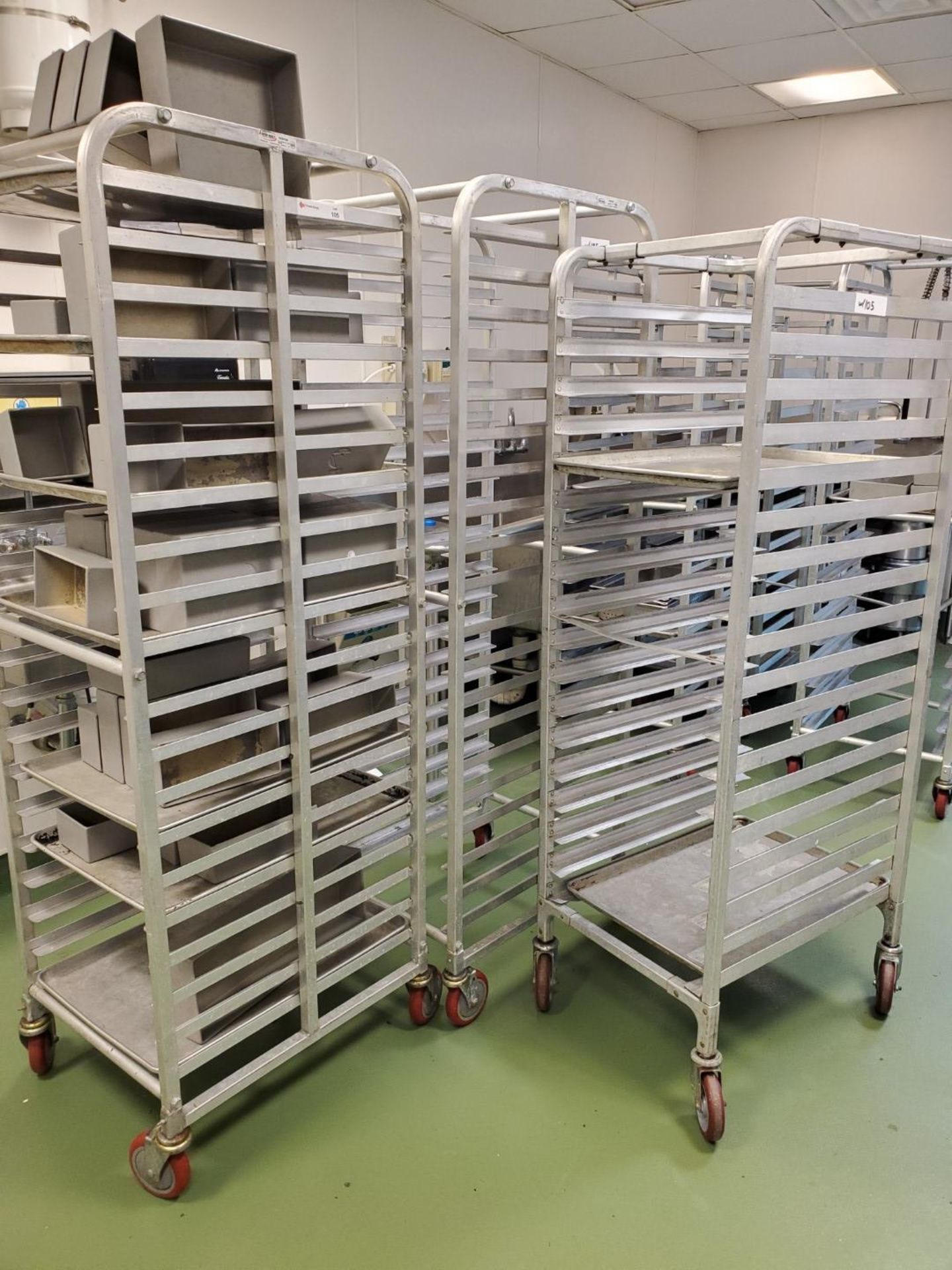 Lot of (3) Tray Racks, with contents