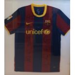 Barcelona. Signatures include, Messi, Busquets, Alves, Piques, Puyol, Villa, Valdes, Pedro. Inestia.