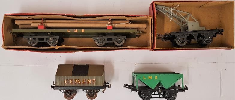 Four Hornby "0" Gauge Vehicles - No. 2 Lumber Wagon; No.1 Crane Truck; Cement Wagon; and Hopper