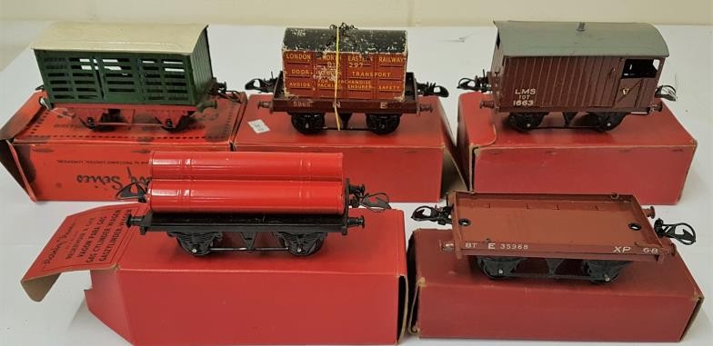 Five Hornby "0" Gauge Wagons - Flat Truck With Container; No.1 Milk Traffic Van; Goods Brake Van;