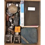 Collection of Various Camera Equipment and Folders Relating to Cameras