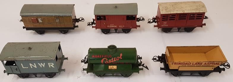 Collection of Six Hornby Wagons including Wakefield Castrol Motor Oil, L.N.E.R. and Trinidad Lake